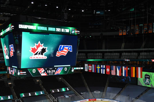 The score clock at Rogers Place displays the logos of both
