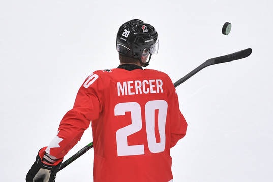 Dawson Mercer of Canada bounces a puck off the blade of his