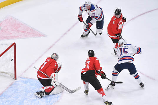 Alex Turcotte of USA scores the 1-0 goal