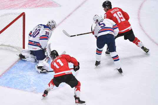 Spencer Knight of USA makes a save