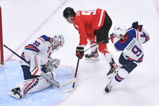 Spencer Knight of USA makes a save