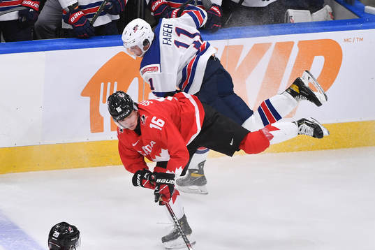 Ryan Suzuki of Canada collides with Brock Faber of USA