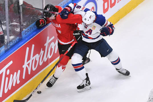 Landon Slaggert of USA and Braden Schneider of Canada