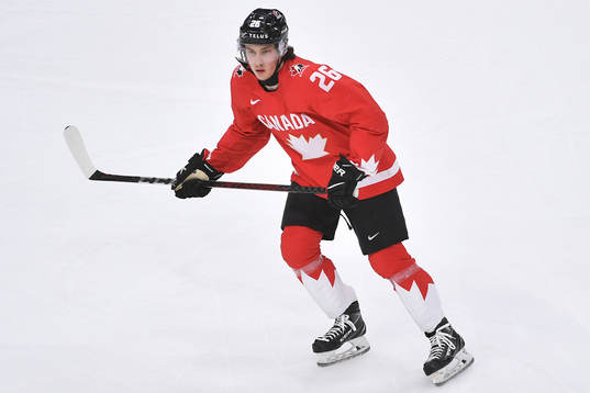 Philip Tomasino of Canada skates