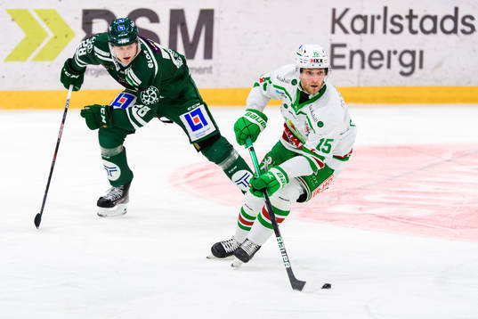 Färjestads Linus Arnesson och Rögles Simon Ryfors