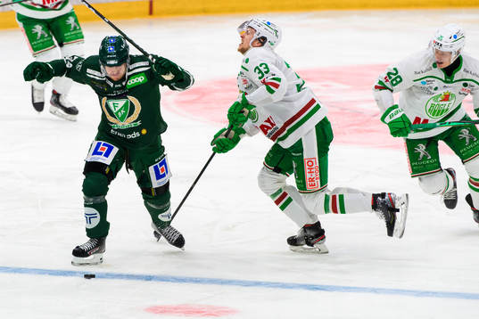 Färjestads Michael Lindqvist och Rögles Niklas Hansson