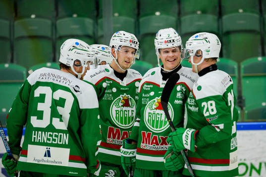 Rögles Erlend Lesund och Adam Tambellini jublar