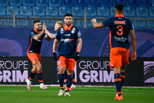Andy DELORT of Montpellier celebrates his scoring with