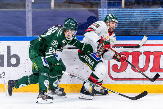 Färjestads Linus Arnesson och Frölundas Joel Lundqvist