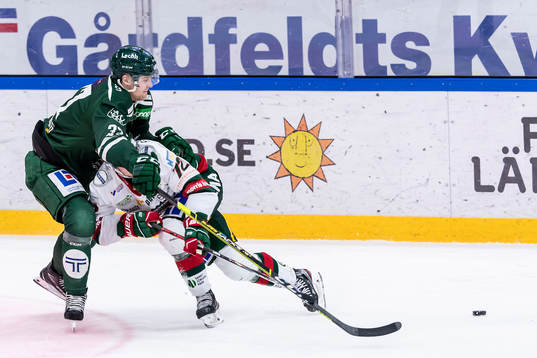 Färjestads Adam Ginning och Frölundas Patrik Carlsson