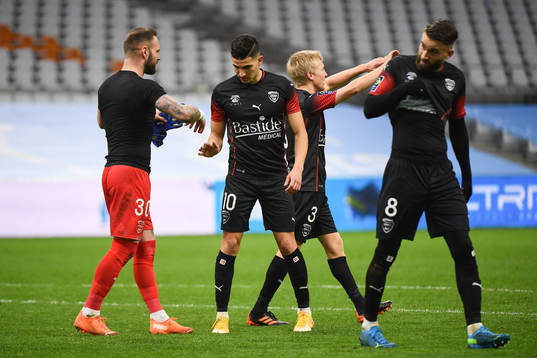 Baptiste REYNET of Nimes celebrates the victory with