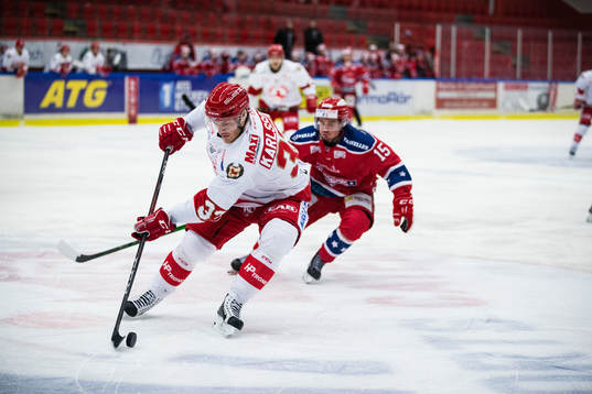 Trojas Daniel Karlsson Thörnros och Huddinges Anton Kalte