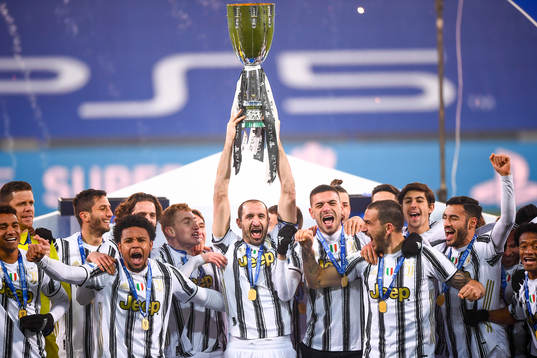 Dejan Kulusevski and Giorgio Chiellini of Juventus