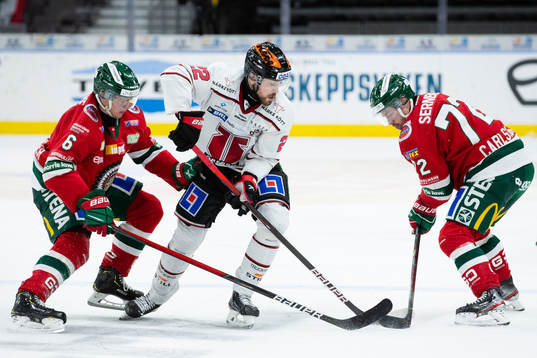 Frölundas Mattias Norlinder  och Patrik Carlsson mot