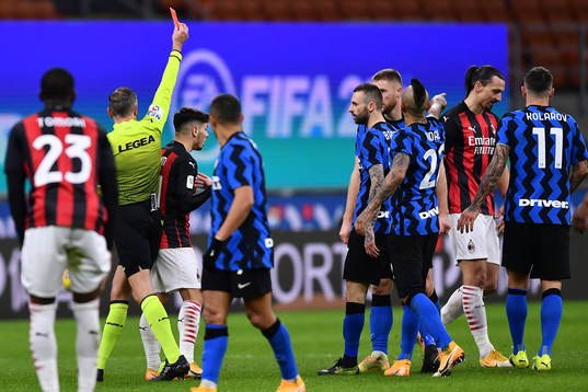 Zlatan Ibrahimovic of Milan receives a red card