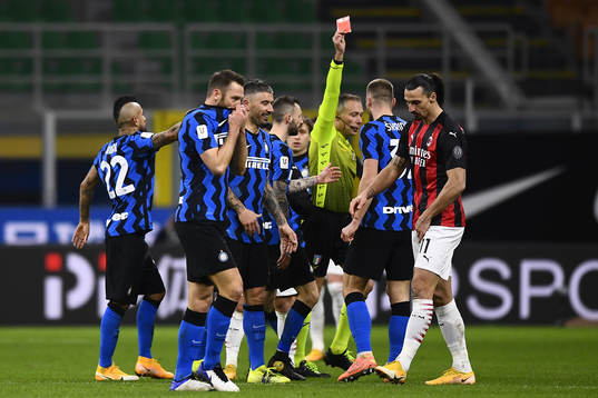 Zlatan Ibrahimovic of Milan receives a red card
