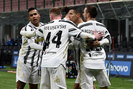 Cristiano Ronaldo celebrate with Dejan Kulusevski of