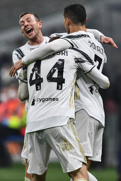 Cristiano Ronaldo celebrate with Dejan Kulusevski of