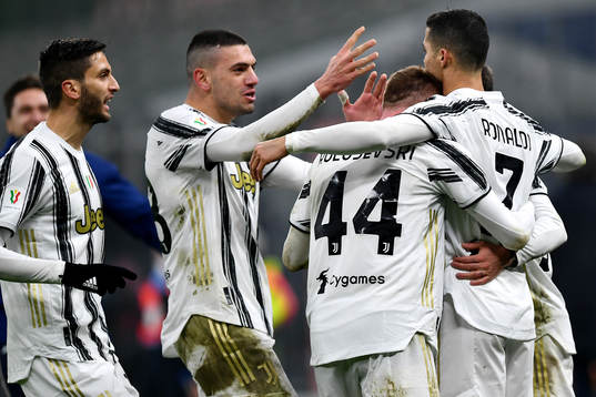 Cristiano Ronaldo celebrate with Dejan Kulusevski of