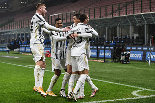 Cristiano Ronaldo celebrate with Dejan Kulusevski of