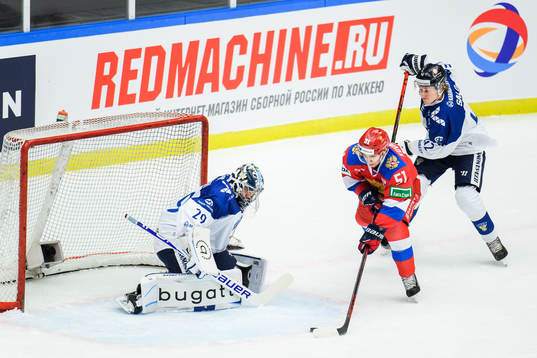 Nikolai Kovalenko of Russia and goalkeeper Harri Säteri of