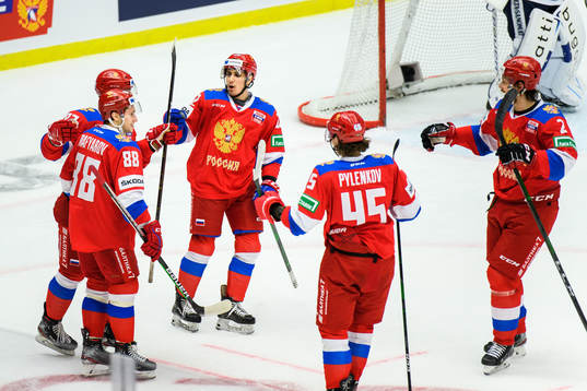 Ivan Chekhovich of Russia celebrate with teammates