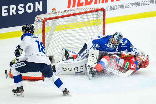 Goalkeeper Harri Säteri of Finland and Nikolai Kovalenko