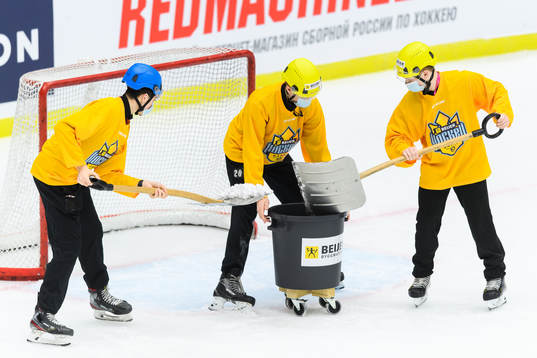 The ice crew cleans the ice