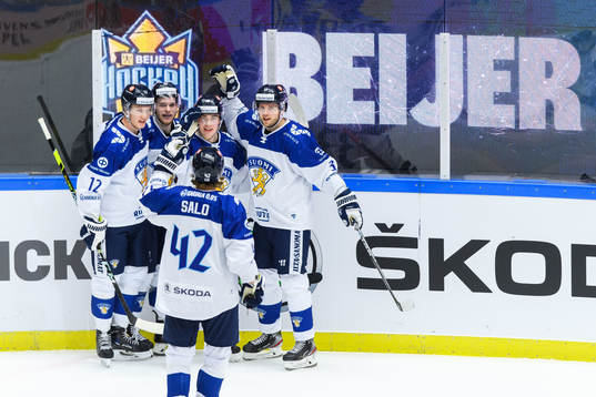 Jere Innala of Finland celebrate with teammates