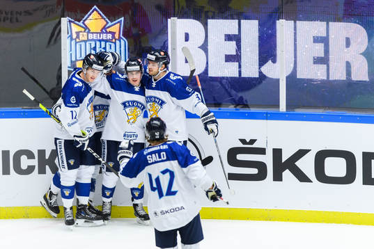 Jere Innala of Finland celebrate with teammates