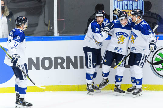 Jere Innala of Finland celebrate with teammates