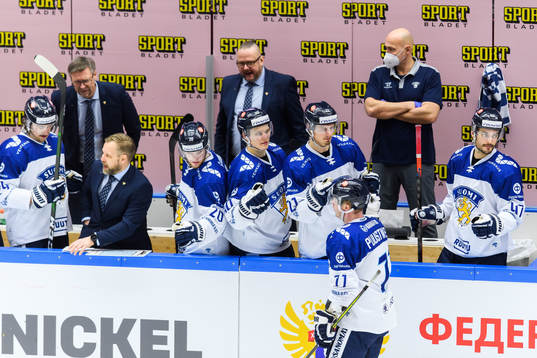Juuso Puustinen of Finland celebrate with teammates