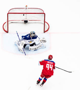 Vladimir Butuzov of Russia scores the 3-1 goal behind