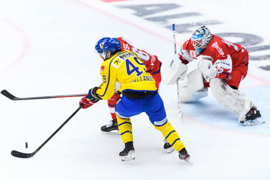 Filip Hållander of Sweden and goalkeeper Patrik Bartosak