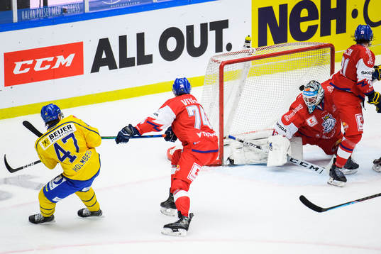 Pontus Holmberg of Sweden scores the 1-2 goal behind