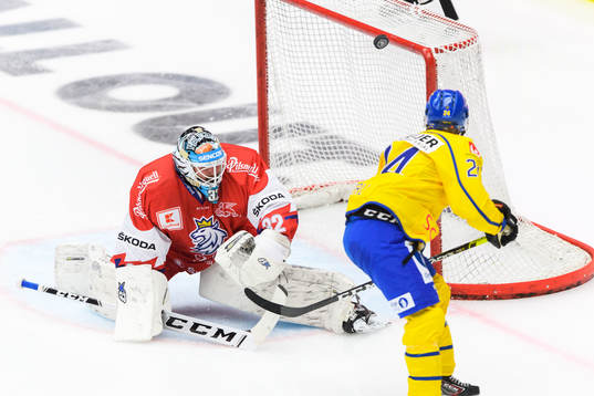 Andreas Wingerli of Sweden and goalkeeper Patrik Bartosak