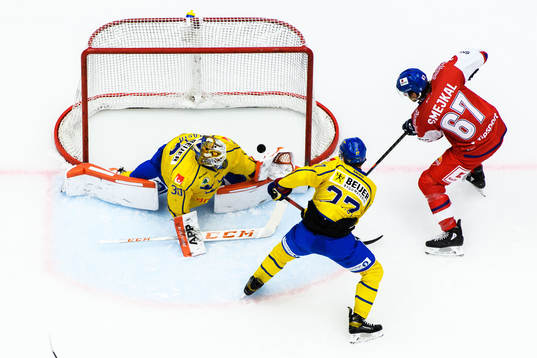 Jiri Smejkal of Czech Republic scores 1-0 behind goalkeeper