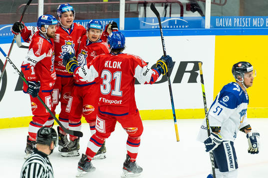 Matej Blumel celebrates with team mates