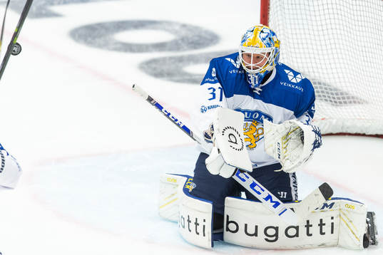 goalkeeper Janne Juvonen of Finland