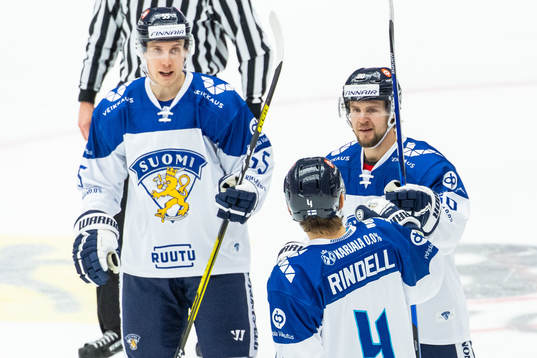 Teemu Turunen of Finland celebrates with Axel Rindell