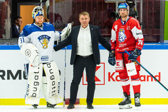 Goalkeeper Janne Juvonen of Finland and Ondrej Vitasek of