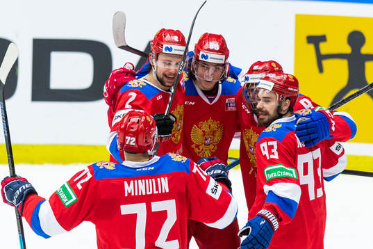 Danila Moiseyev of Russia celebrates with team mates