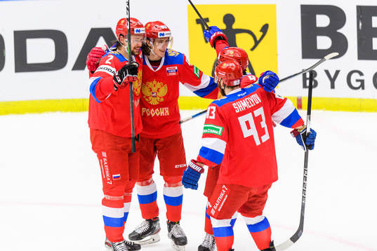 Danila Moiseyev of Russia celebrates with his teammates