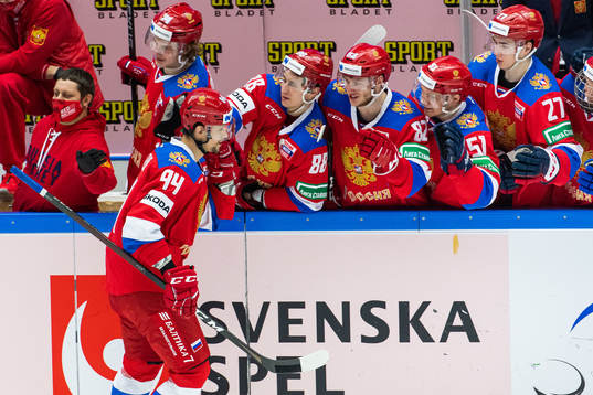Vladimir Butuzov of Russia celebrates with team mates