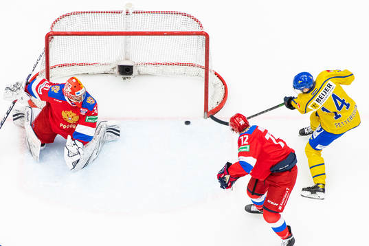 Emil Pettersson of Sweden scores 1-0 behind goalkeeper