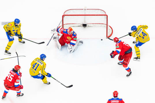 Pontus Holmberg and Daniel Viksten of Sweden see Emil