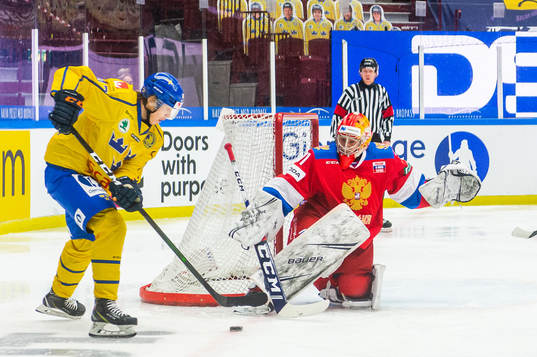 Pontus Holmberg of Sweden against goalkeeper Alexander