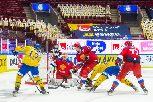 Max Friberg of Sweden against goalkeeper Alexander Samonov