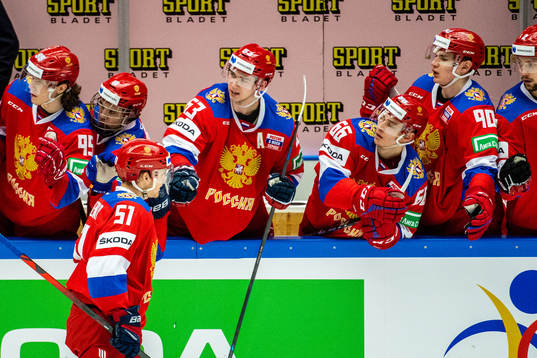 Nikolai Kovalenko of Russia celebrates with teammates