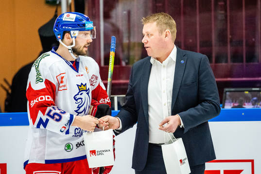 Michael Spacek of Czech Republic is awarded players of the
